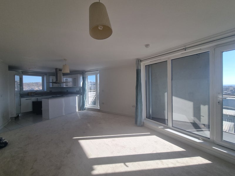 Photo 1: Living room with kitchen