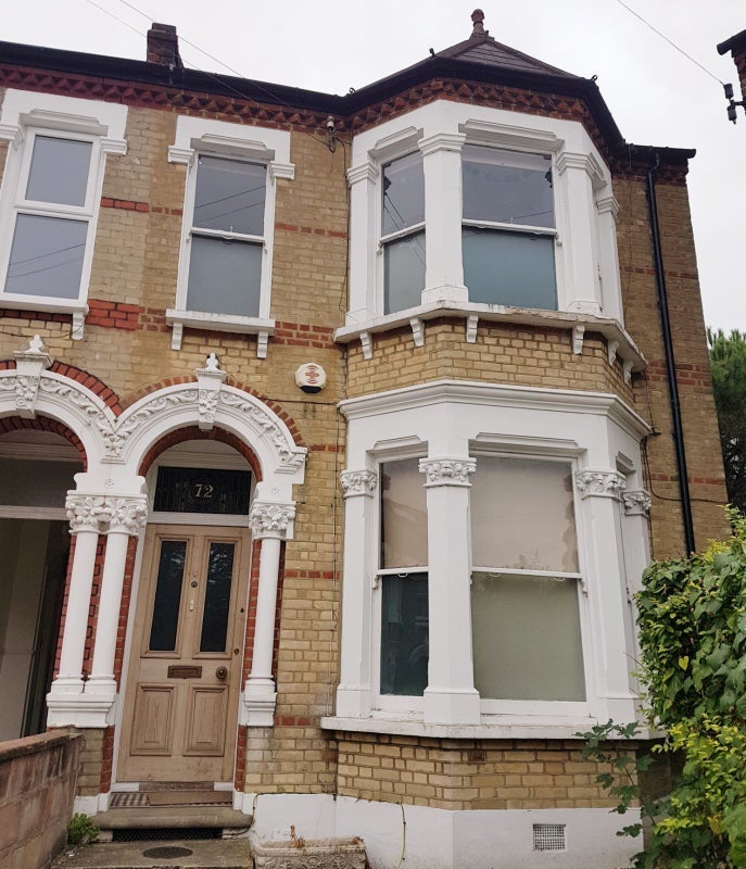 Photo 1: front of house
