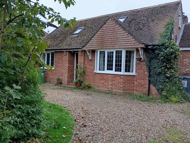 Photo 1: Front of house