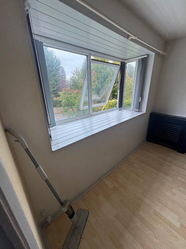 Photo 1: Large bay window view