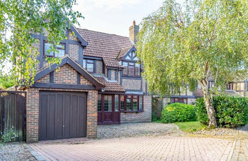 Photo 1: Front of house, car parking on drive 