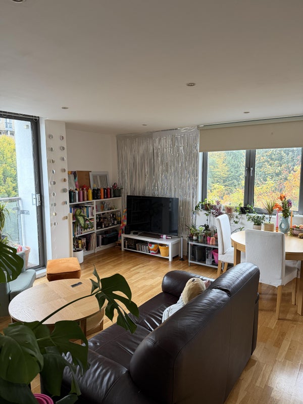 Photo 1: Shared living room