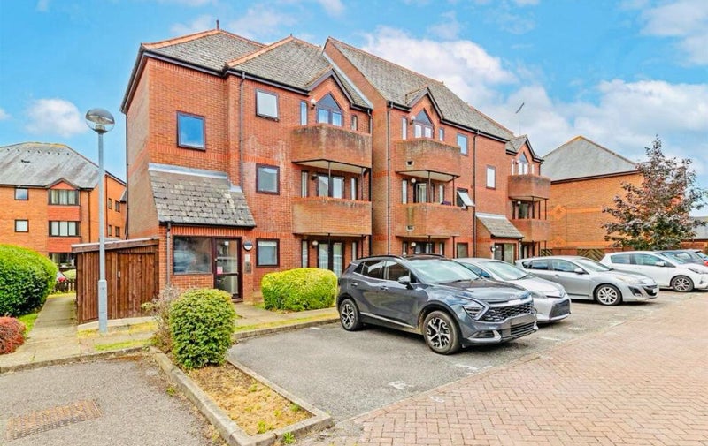 Photo 1: Outside with parking