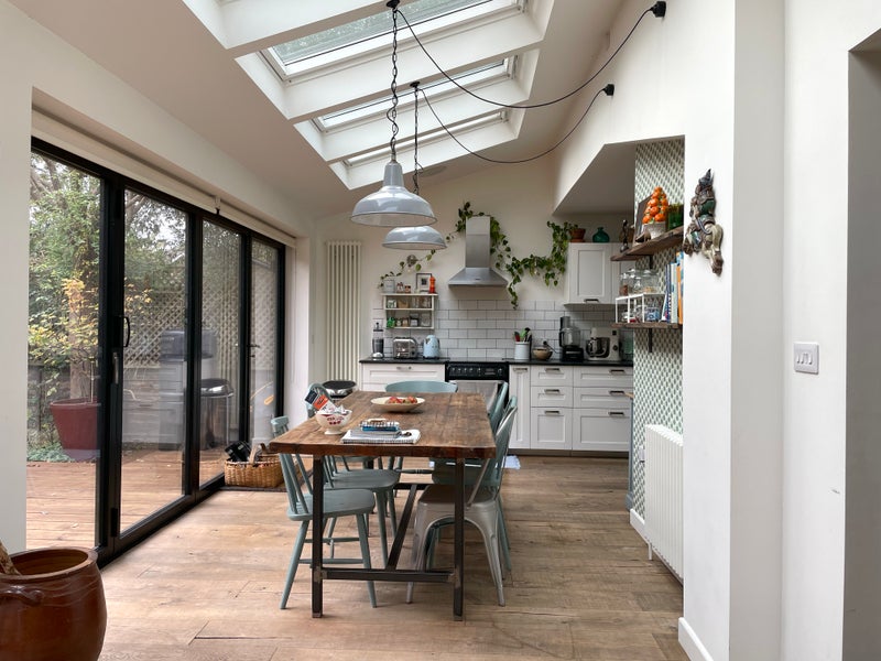 Photo 1: Open kitchen with table