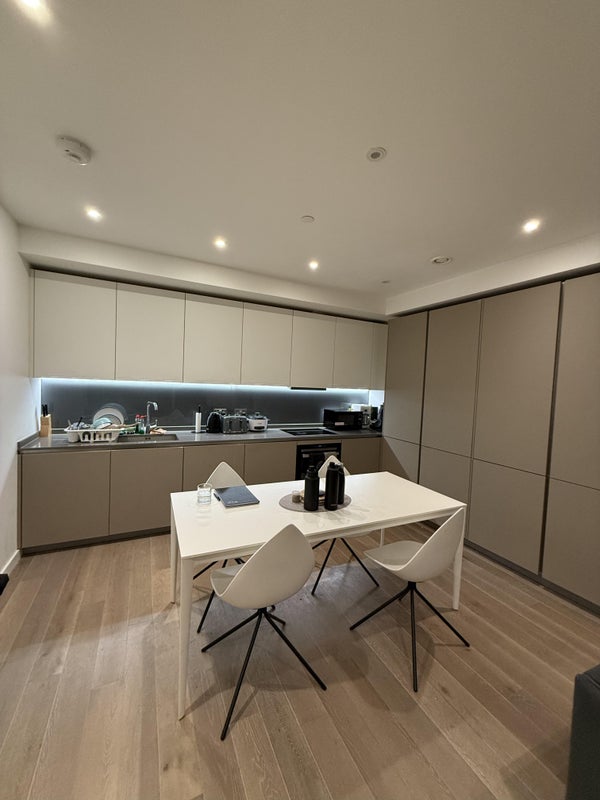 Photo 1: Kitchen and Dining
