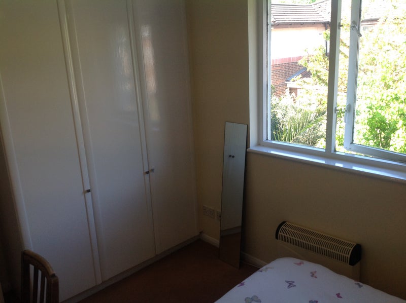 Photo 1: Back Bedroom with garden view
