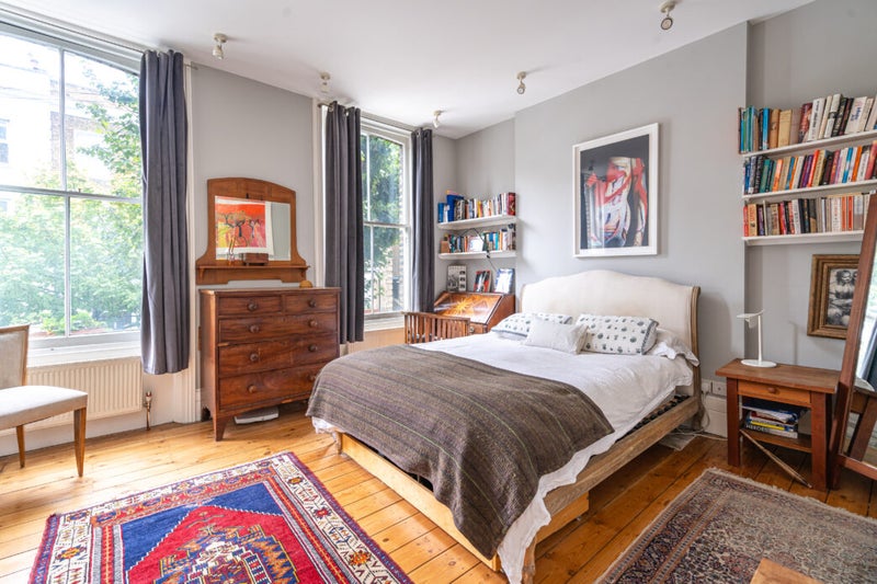 Photo 1: Large Bedroom with Storage 