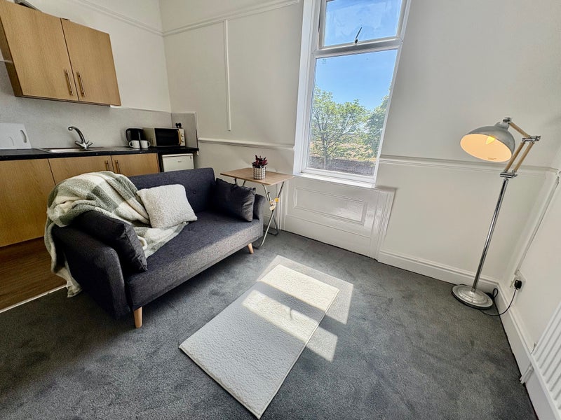 Photo 1: Flat 2 - Living/ Kitchen area 