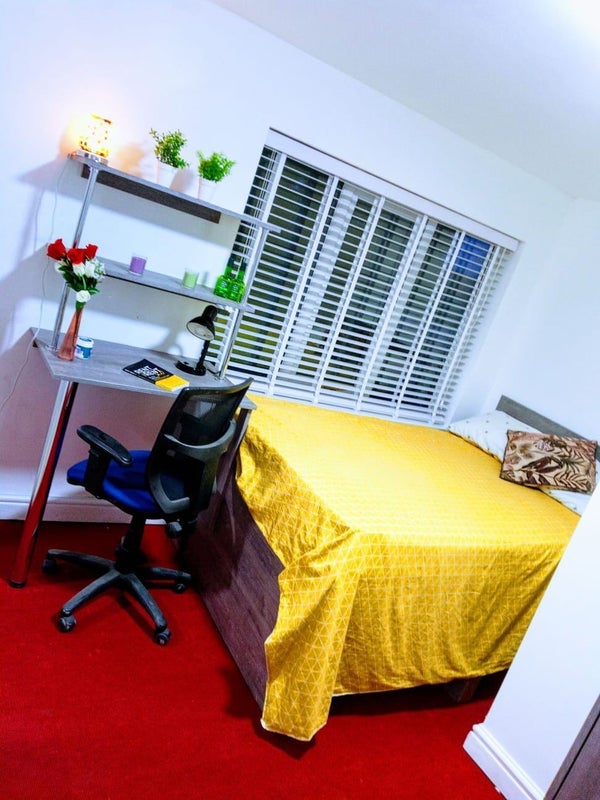Photo 1: Double bed with ample storage space underneath!
