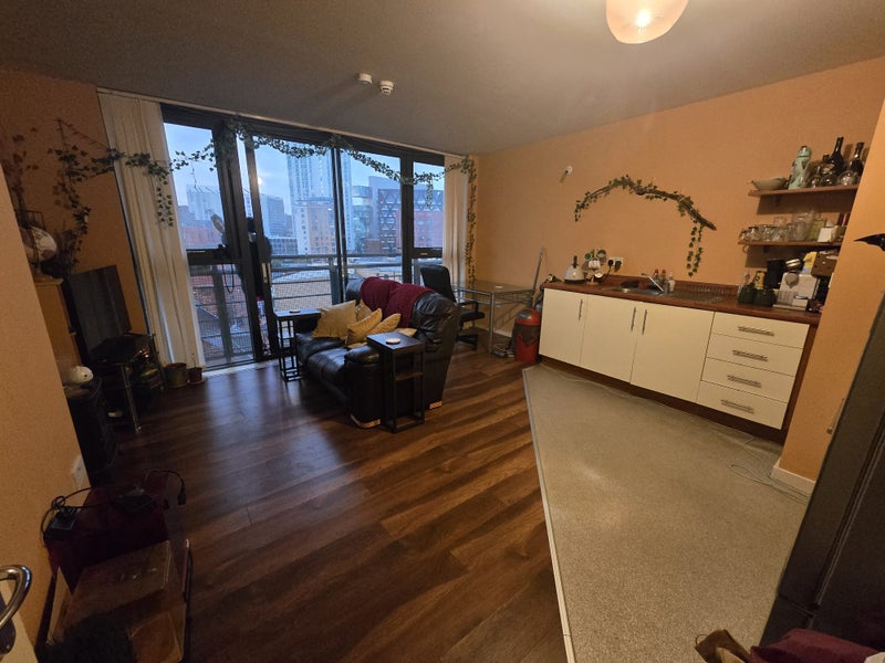 Photo 1: Living Room and Kitchen