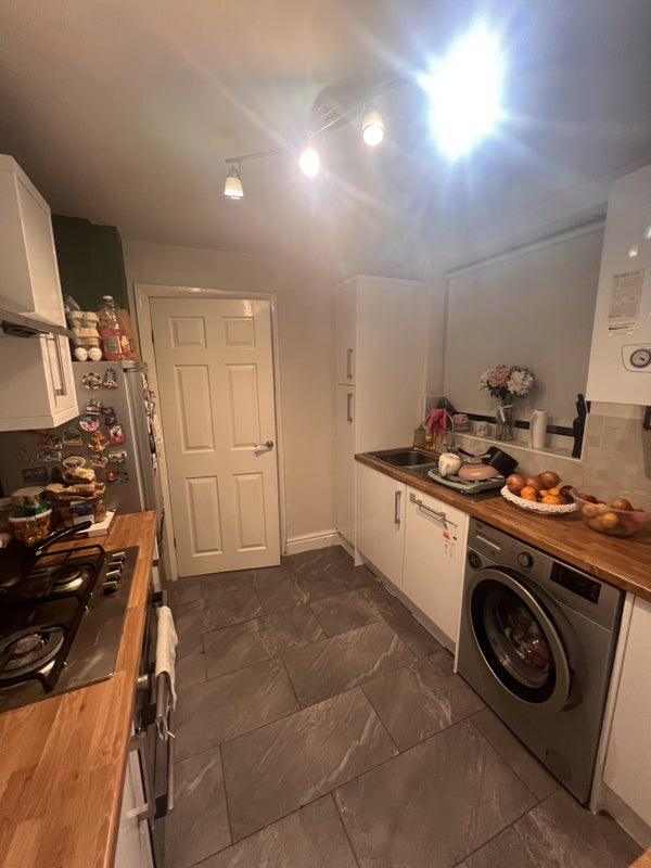 Photo 1: Kitchen space with shared amenities