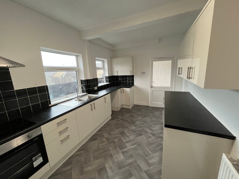 Photo 1: Kitchen
