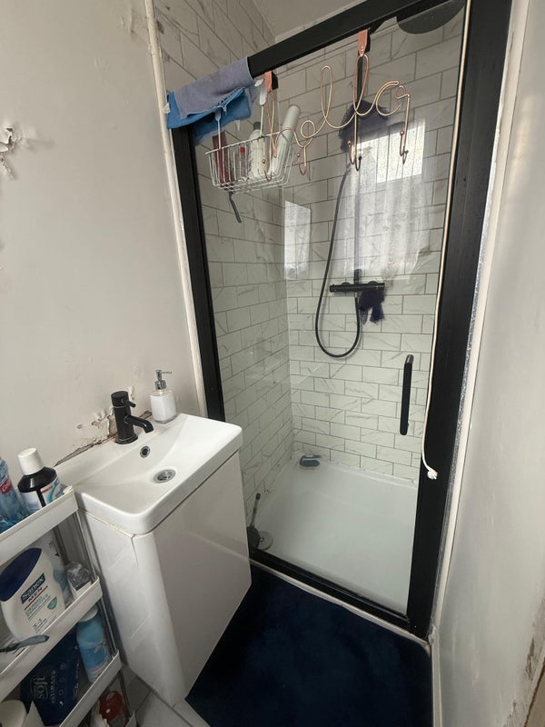Photo 1: Rm #3 - 'Available' 3 piece ensuite (toilet on the left below the window) with corner double room