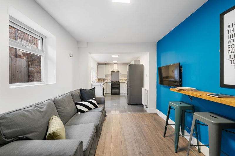 Photo 1: Kitchen/Living Room