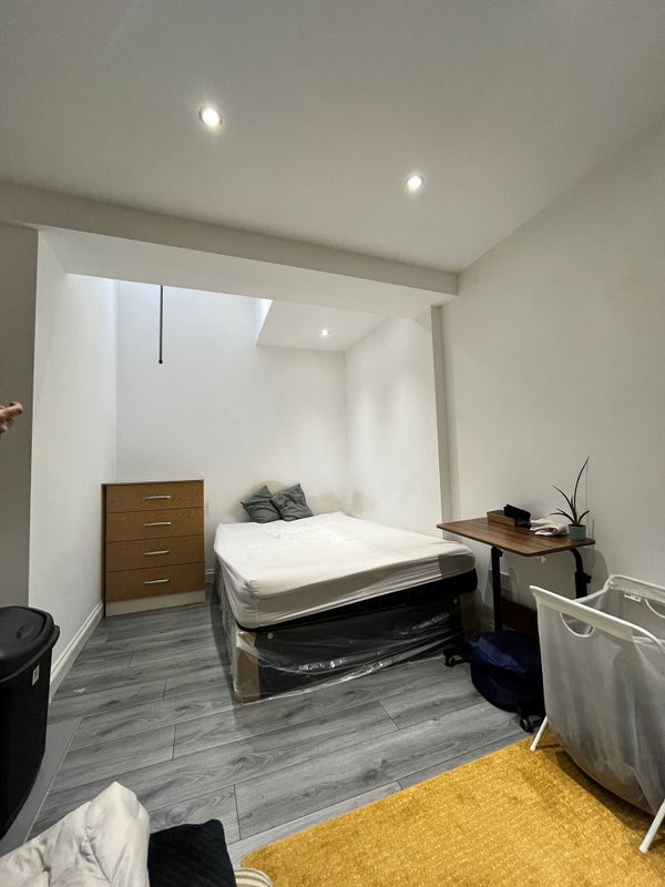 Photo 1: Spacious Bedroom / Double bed / Mattress / Chest of drawers