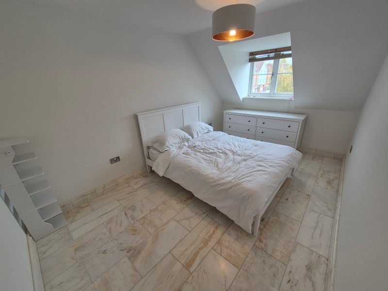 Photo 1: King size bed on 2nd floor of townhouse