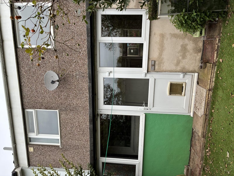 Photo 1: Front of house