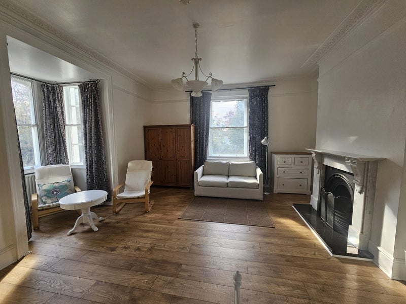 Photo 1: Room with sitting area