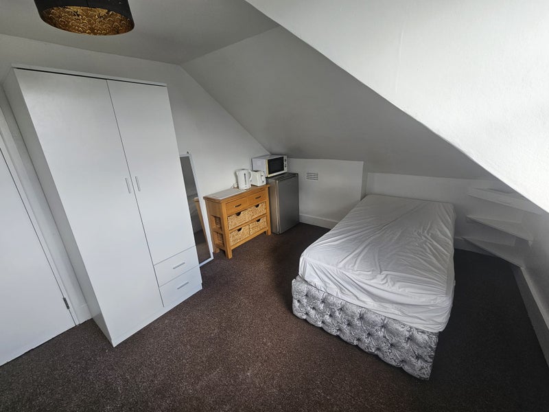 Photo 1: Attic room