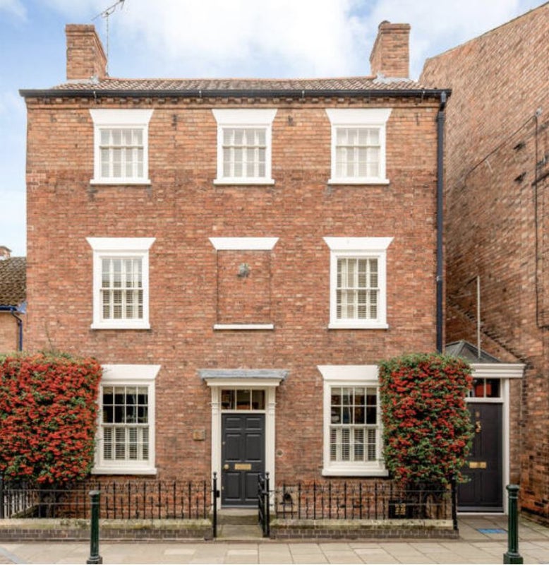 Photo 1: Front of house