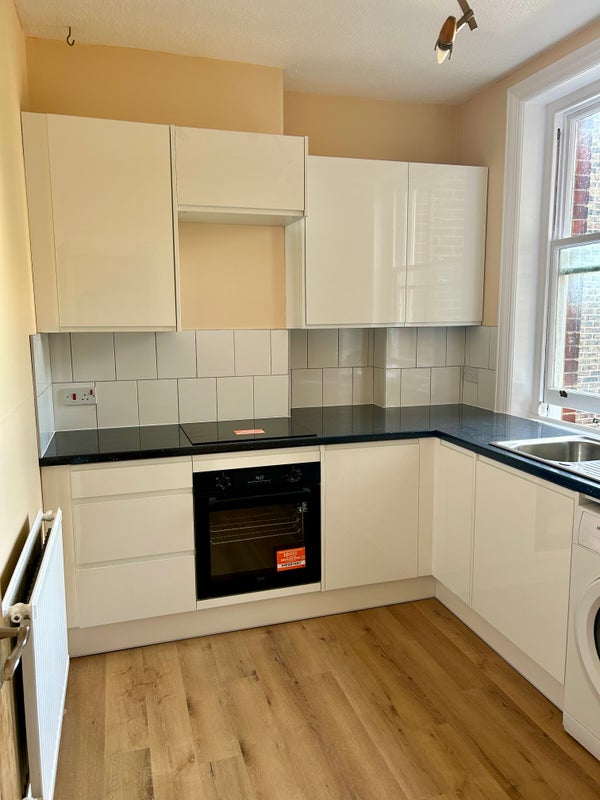 Photo 1: Brand new fitted kitchen