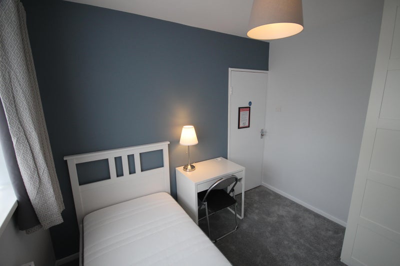 Photo 1: Single Room