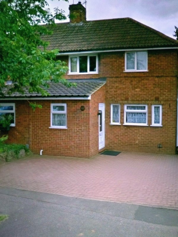 Photo 1: Front - Driveway