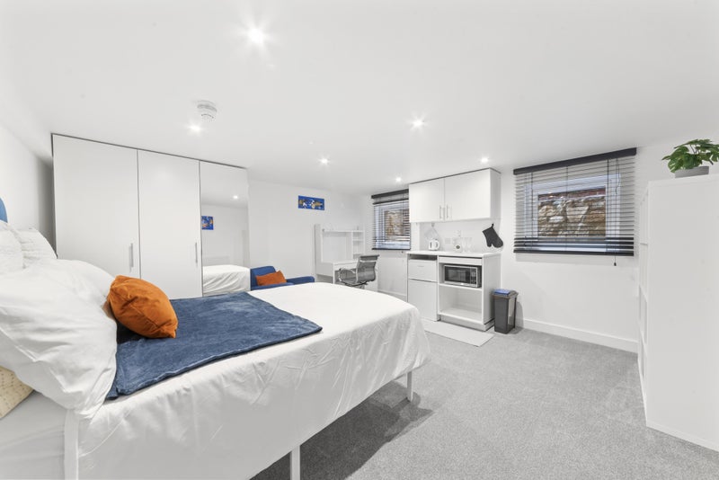 Photo 1: Basement Room with tea station