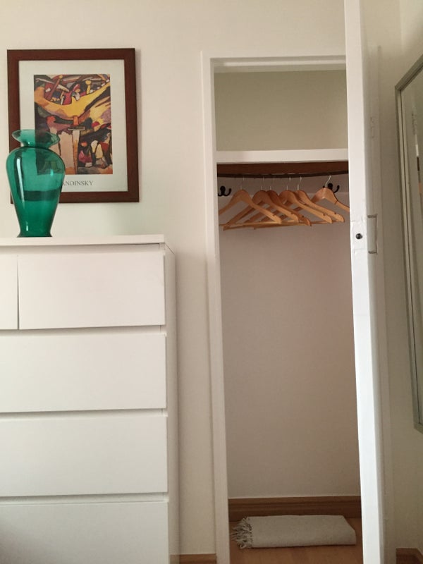 Photo 1: bedroom with chest of drawers and wardrobe