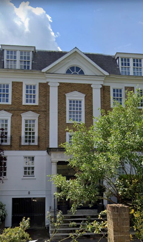 Photo 1: front of building, underground parking entrance to the left