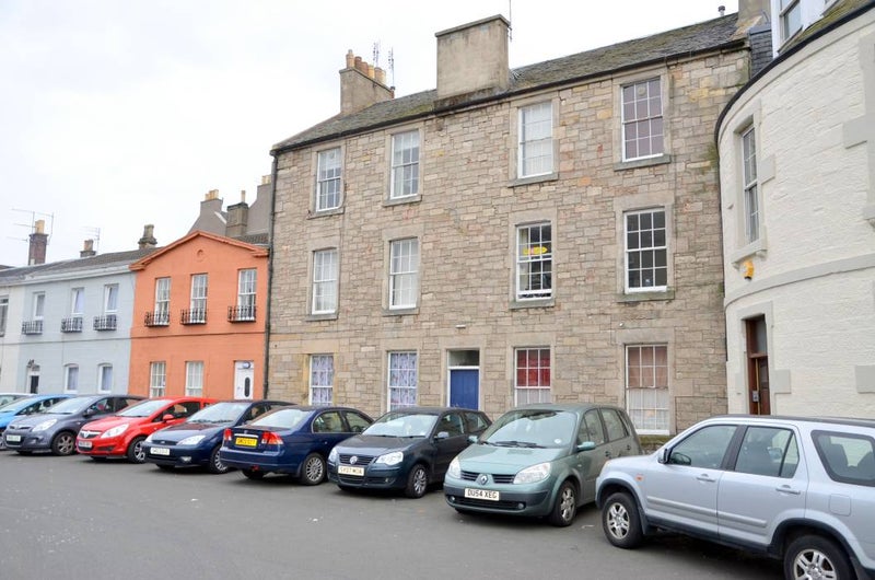 Photo 1: Front with free parking