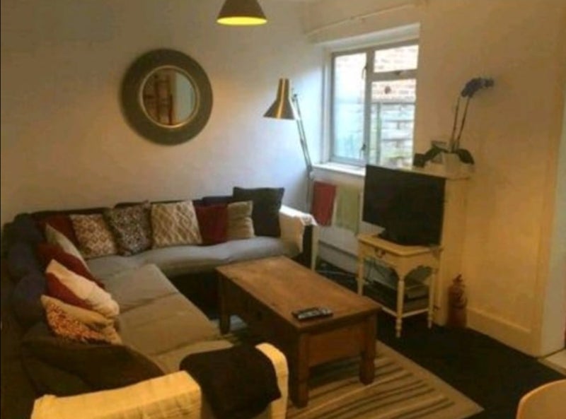 Photo 1: Shared living room