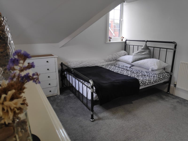 Photo 1: King sized bed