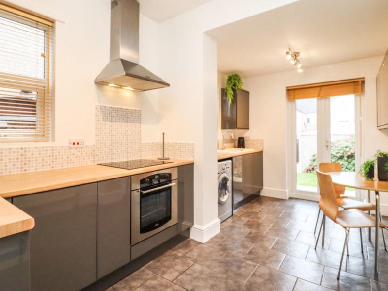 Photo 1: Large kitchen/diner with patio doors to garden