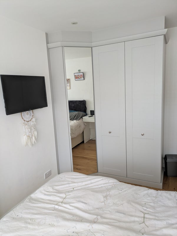 Photo 1: Triple wardrobe with mirror 