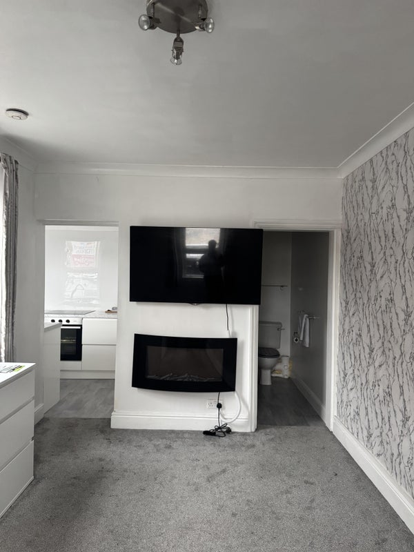 Photo 1: Bedroom/Living Room and Access to Bathroom and Kitchen