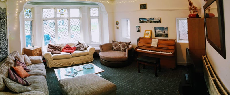 Photo 1: Communal living room