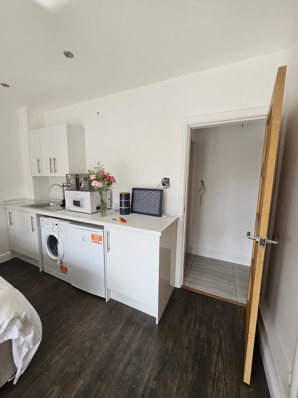 Photo 1: Kitchenette well stocked