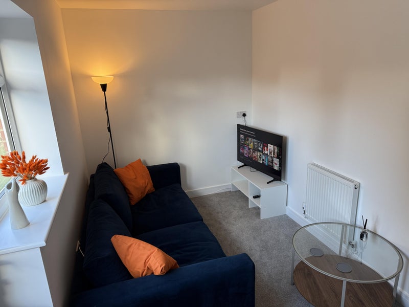 Photo 1: Shared Lounge