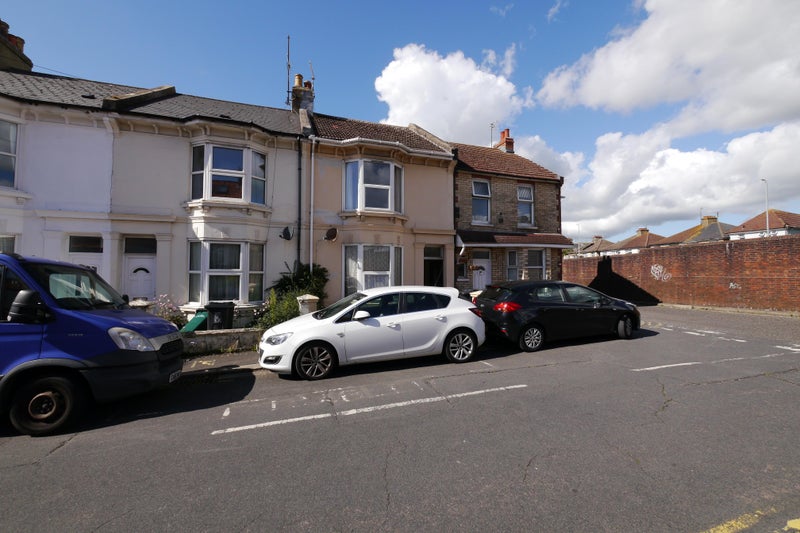 Photo 1: Front of house