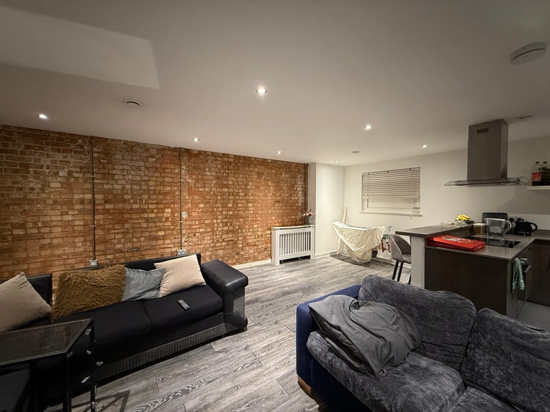 Photo 1: Living Room/Kitchen