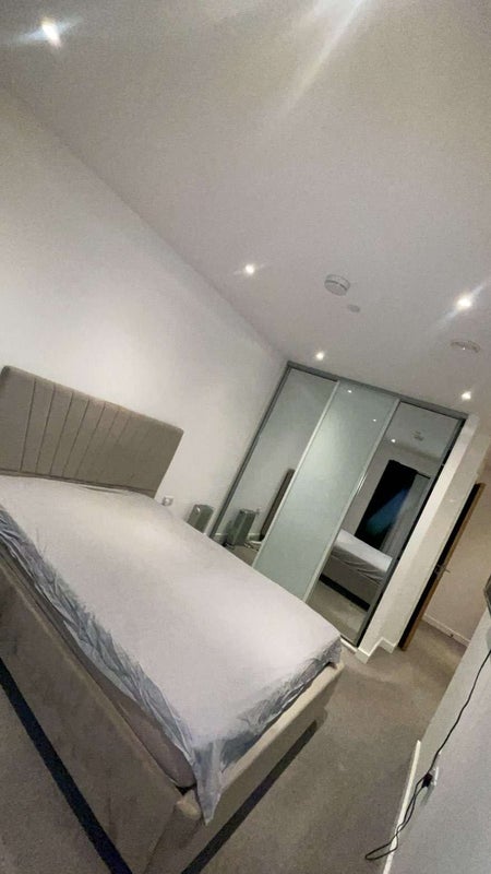 Photo 1: Double bedroom with inbuilt wardrobe