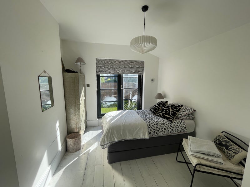 Photo 1: Bedroom opens onto sunny terrace