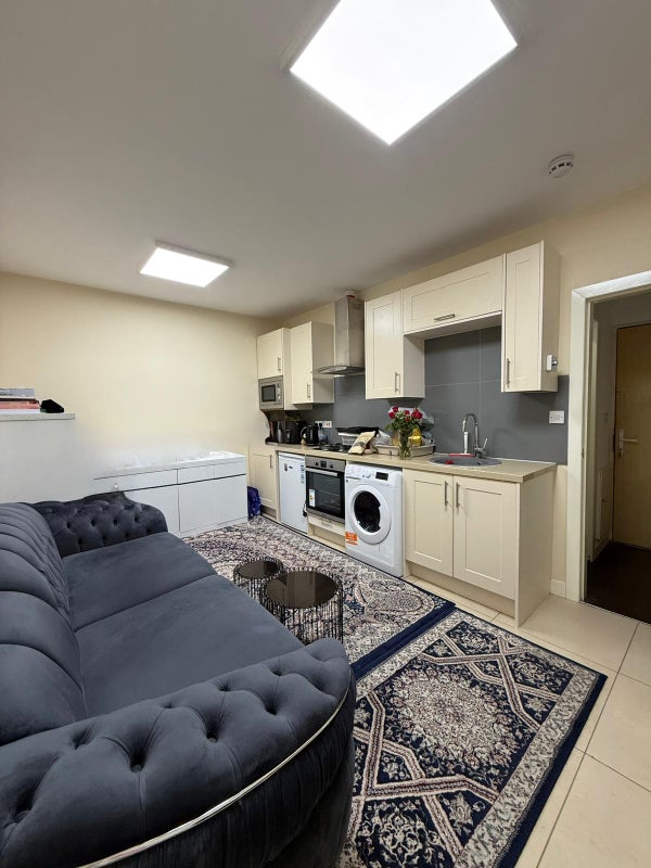 Photo 1: Kitchen with appliances / Living area / Sofa / Table /Plenty of storage available