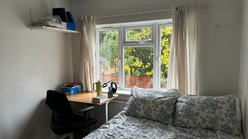 Photo 1: Your window overlooks the block garden