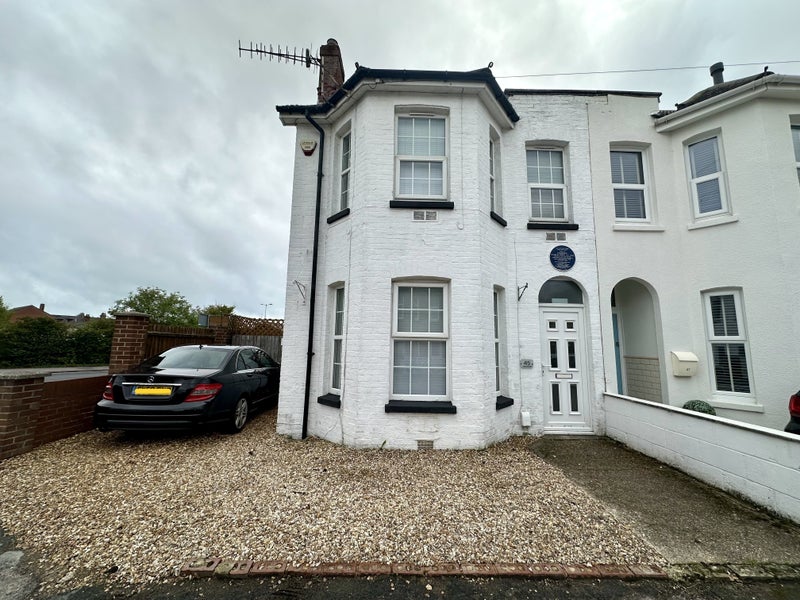 Photo 1: Front of property and parking