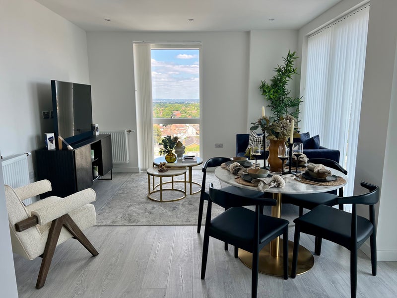 Photo 1: Living room and dining area