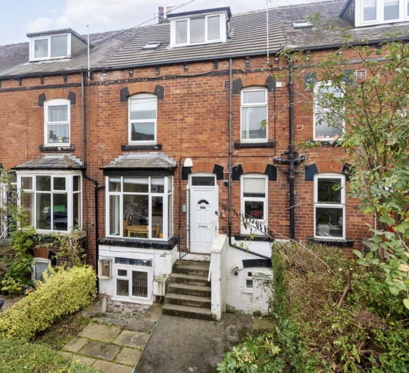 Photo 1: Front of house 