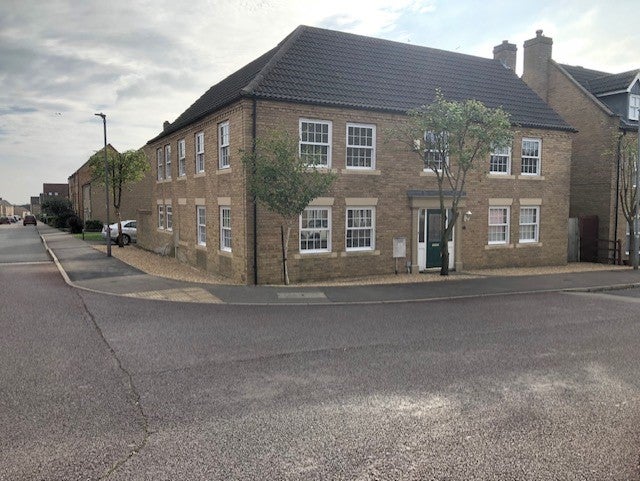 Photo 1: Front and side of our big house