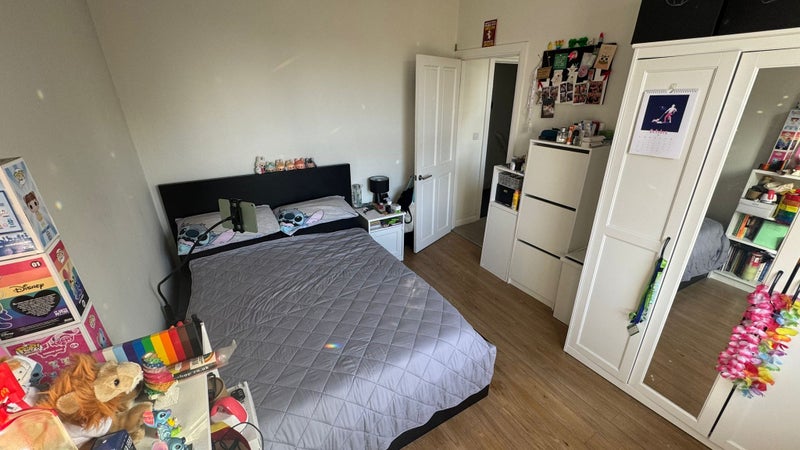 Photo 1: Double bedroom (comes unfinished). Door leads to kitchen.